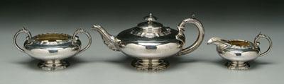 Appraisal: Three-piece English silver tea service with scalloped and stepped rims