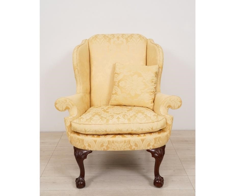 Appraisal: Kindel Chippendale style mahogany Winterthur Reproduction wing chair with ball