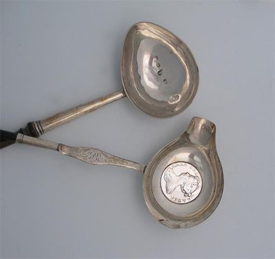 Appraisal: A George II punch ladle with a 'goose egg' bowl