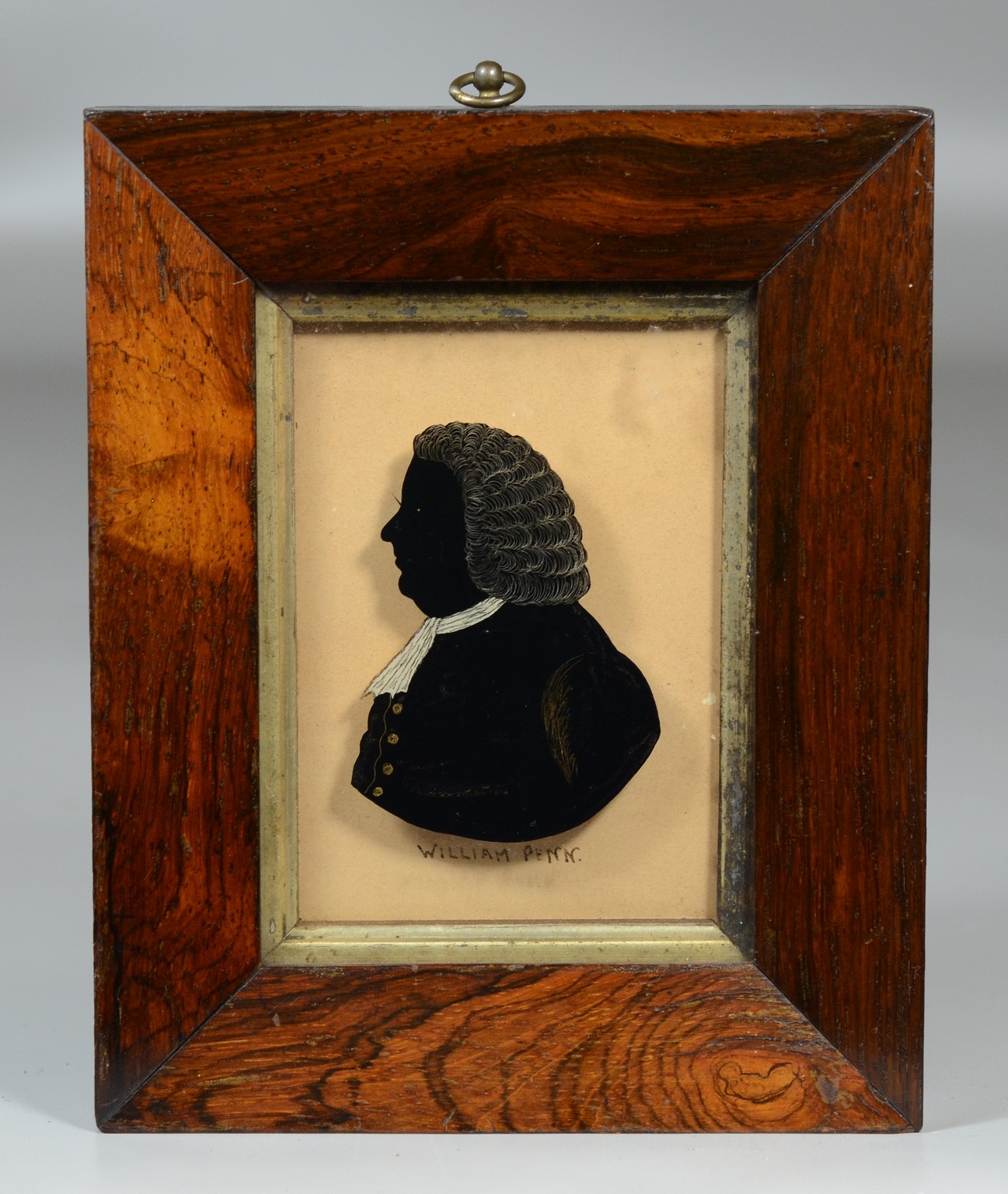 Appraisal: Reverse painted on glass silhouette of William Penn bronze and