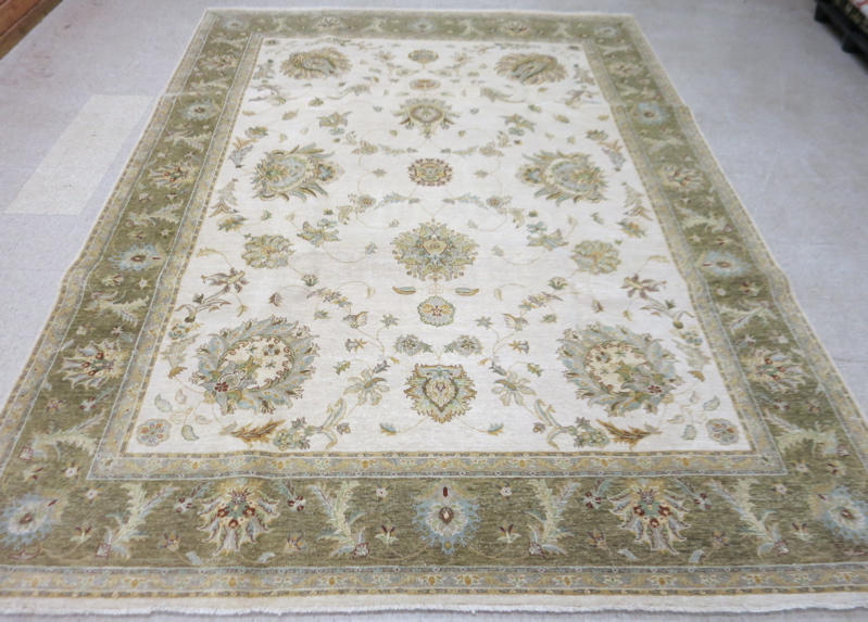 Appraisal: HAND KNOTTED ORIENTAL CARPET Persian Isfahan design of color foliage