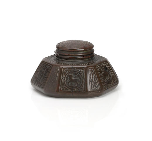 Appraisal: A Tiffany Studios Bronze Zodiac inkwell Of canted hexagonal form