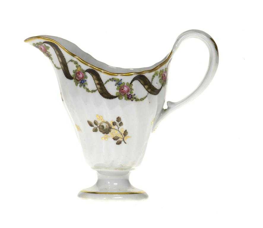 Appraisal: A CHAMBERLAIN WORCESTER SHANKED CREAM JUG pattern painted in sepia