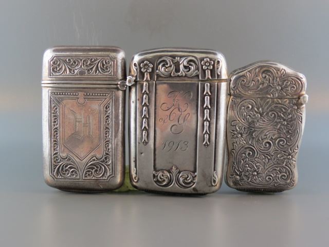 Appraisal: Sterling Silver Match Safes by Webster florals one dated largest