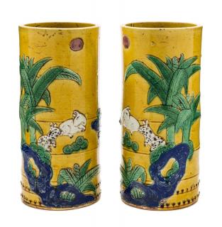 Appraisal: A Pair of Sancai Glazed Porcelain Hat Holders A Pair