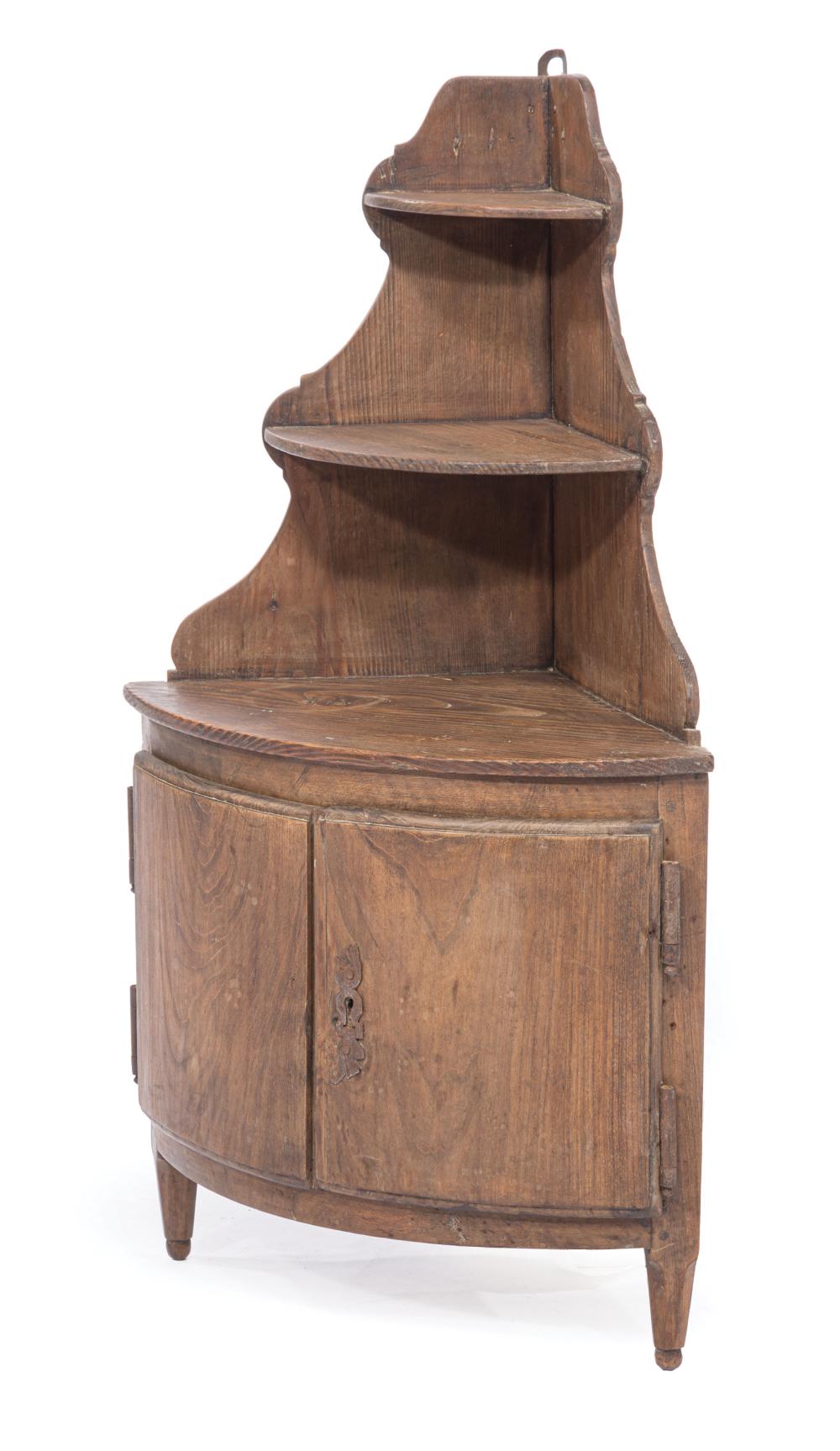 Appraisal: Diminutive Continental Pine Encoignure th c shelves over bowfront cabinet