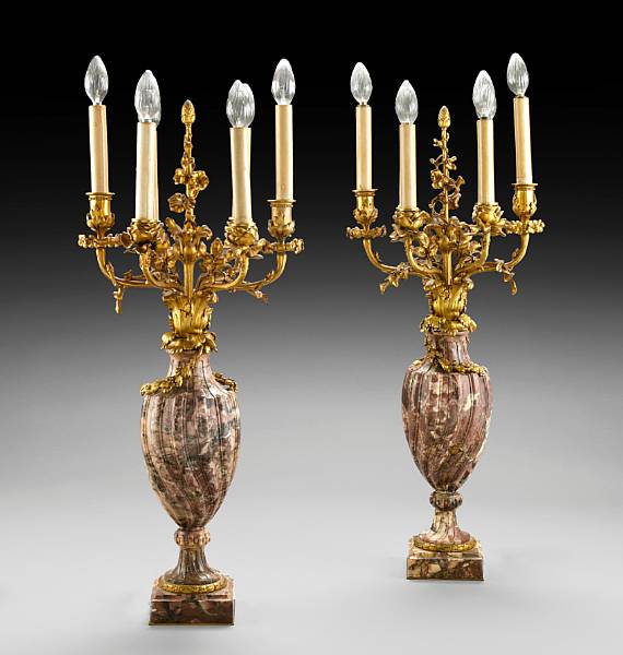 Appraisal: A pair of R gence style gilt bronze and marble