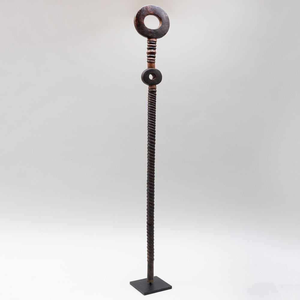 Appraisal: South African Carved Hardwood Staff Zulu Raised on stand in