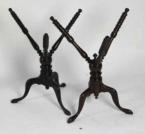 Appraisal: A pair of th Century mahogany cat trivets each with