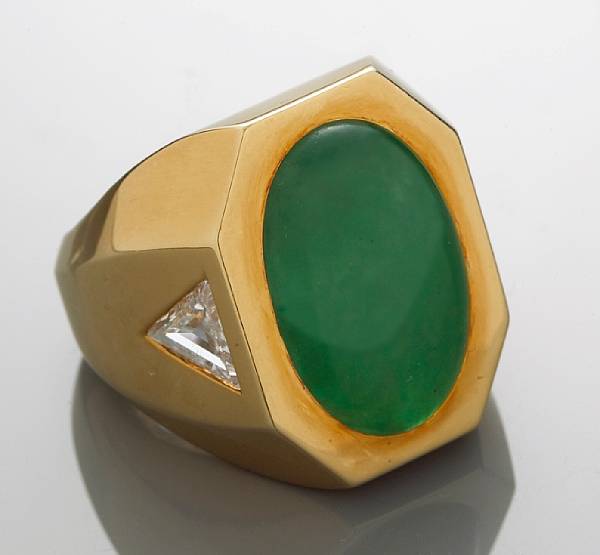 Appraisal: A jadeite jade and diamond ring centering an oval-shaped jadeite