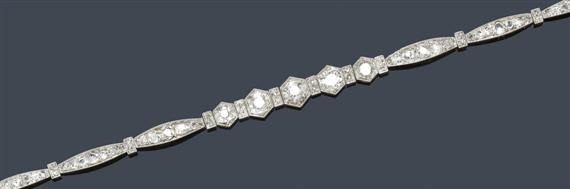 Appraisal: A DIAMOND BRACELET circa Platinum on yellow gold Attractive bracelet