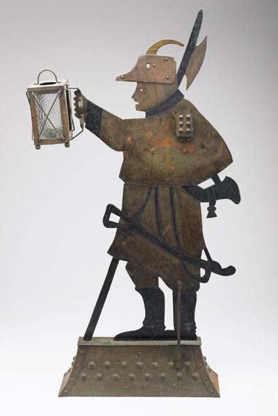 Appraisal: FOLK ART CIGAR CUTTER Figure of a huntsman with lantern