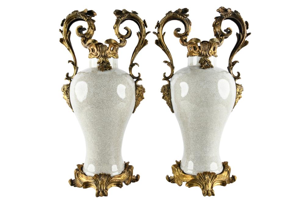 Appraisal: PAIR LOUIS XV-STYLE BRONZE-MOUNTED PORCELAIN VASESlate th century with United