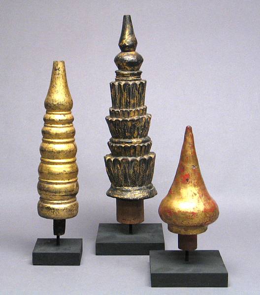 Appraisal: A group of three gilt lacquered wood finials Thailand Burma