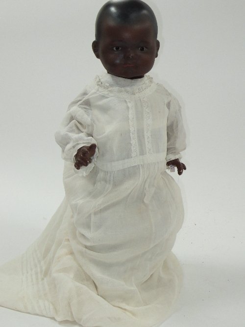 Appraisal: An Armand Marseille bisque head brown doll the head impressed