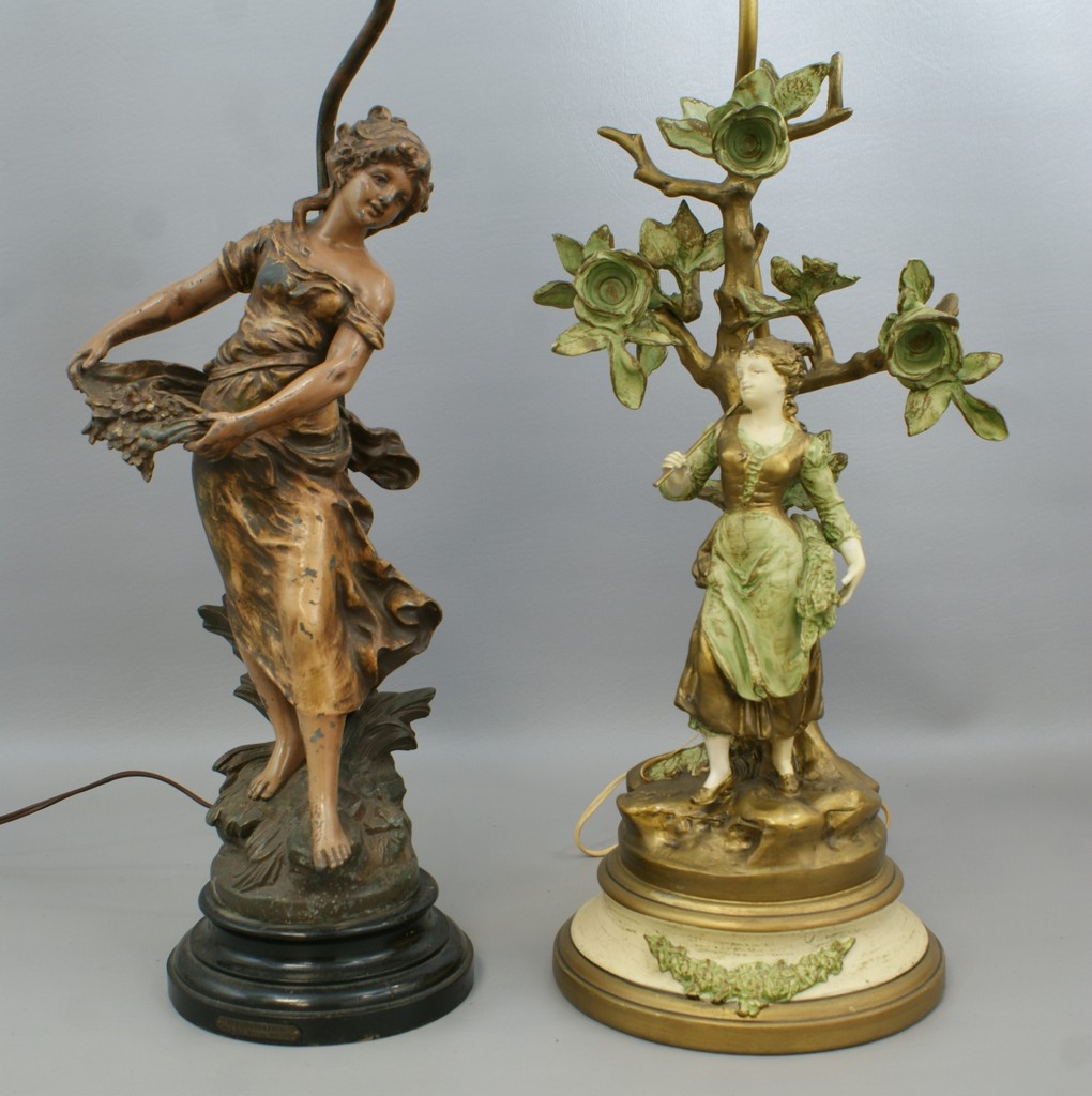 Appraisal: Pr patinated white metal table lamps each w female figures