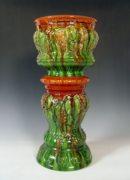 Appraisal: BRUSH MCCOY GRAPE DESIGN JARDINIERE PEDESTAL Jardiniere measures '' high