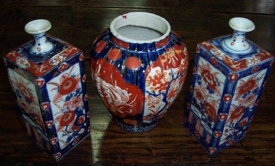 Appraisal: A pair of Imari bottle vases of square shape each