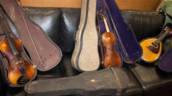 Appraisal: Four student violins with bows in cases and a mandolin