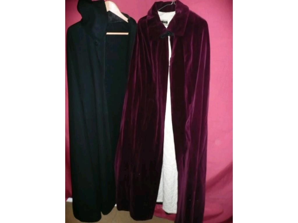 Appraisal: Two evening capes a plum velvet and a black wool