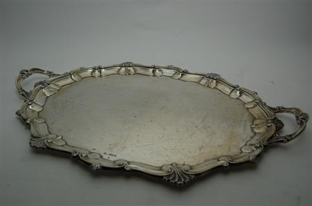 Appraisal: A late victorian twin handled butler's tray Sheffield of shaped