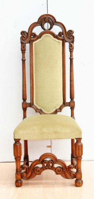 Appraisal: An oak hall chair with green upholstery