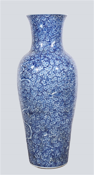 Appraisal: Tall Chinese ceramic flow blue floor vase depicting a blossom