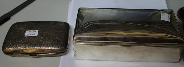 Appraisal: A SILVER CIGAR BOX with engine turned decoration grams together