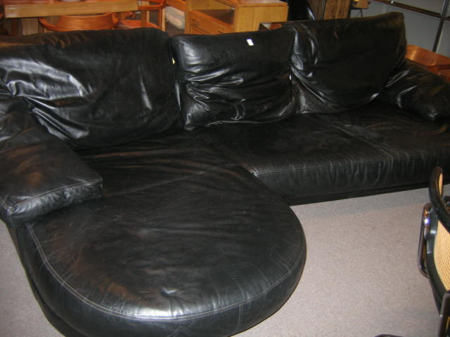 Appraisal: MOLINARI ITALIAN Black leather two piece sofa with adjustable back