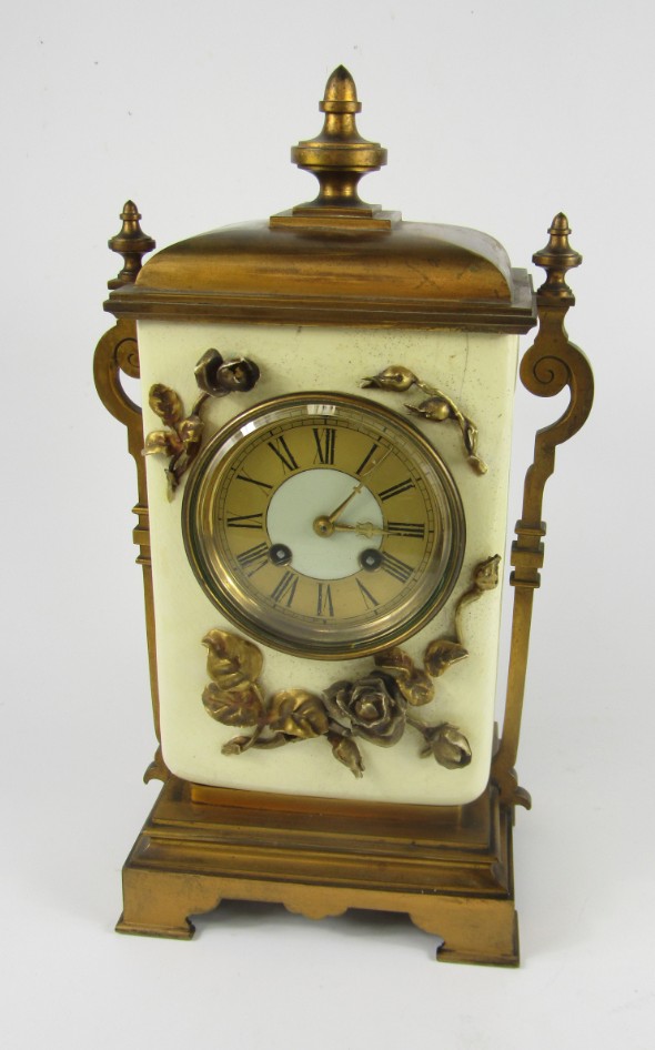 Appraisal: A French early thC burnished brass and pottery mantel clock