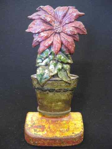 Appraisal: Poinsettia Cast Iron Figural Doorstop '' tall