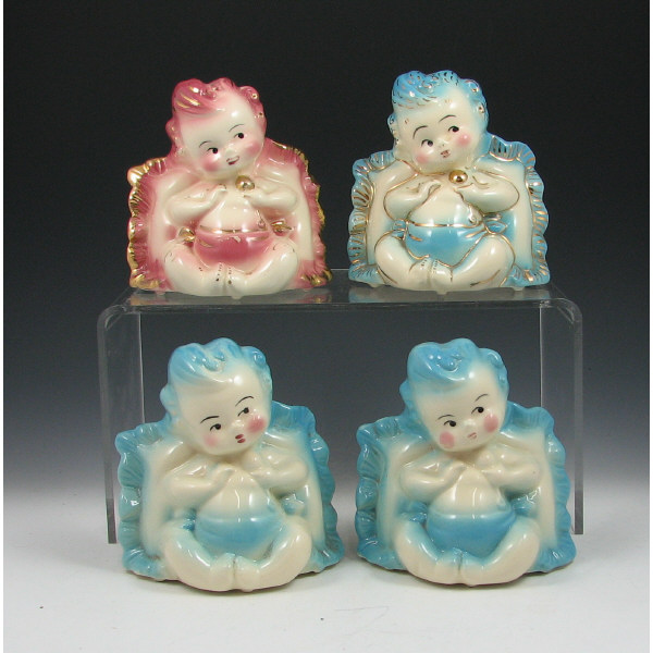 Appraisal: Hull Novelty - Baby Planters Lot of four Novelty baby