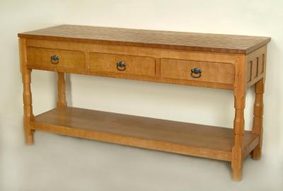 Appraisal: AN ADZED OAK SERVING TABLE by Horace Knight en suite