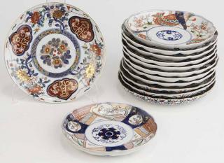 Appraisal: Group Thirteen Assorted Japanese Dishes underglaze blue centers wide segmented