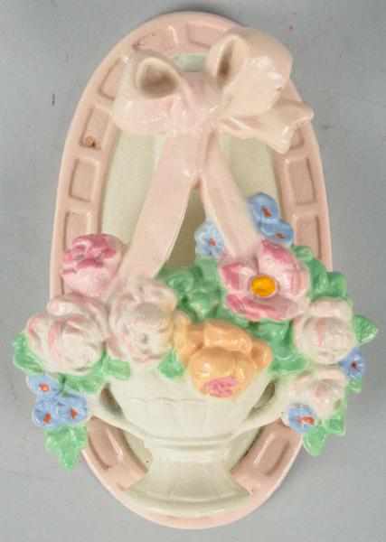 Appraisal: Cast Iron Mixed Flowers in a Vase Doorknocker Description Hubley