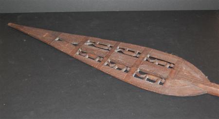 Appraisal: Ethnographic Interest A carved tribal paddle with carved abstract decoration