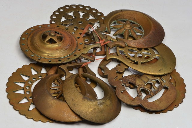 Appraisal: A COLLECTION OF TEN ANTIQUE HORSE BRASSES of varying star