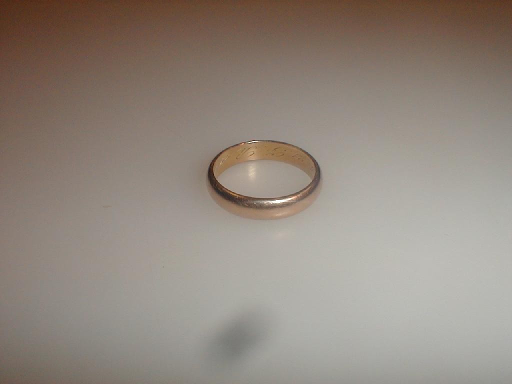 Appraisal: A wedding band stamped g