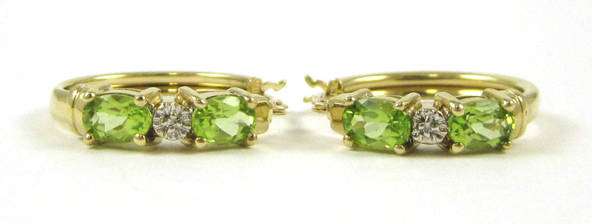 Appraisal: PAIR OF PERIDOT AND DIAMOND HOOP EARRINGS each k yellow