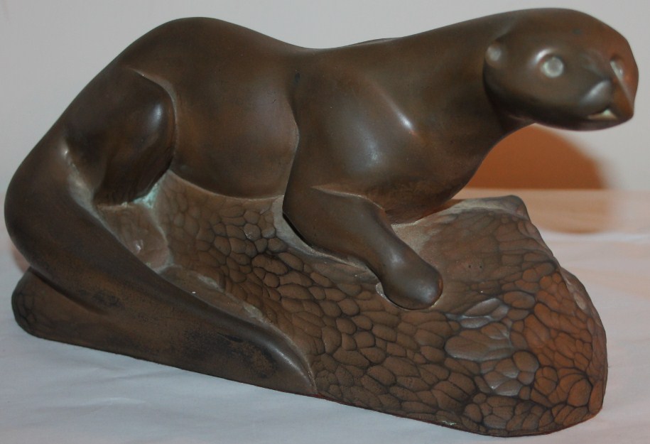 Appraisal: A resin figure of an otter