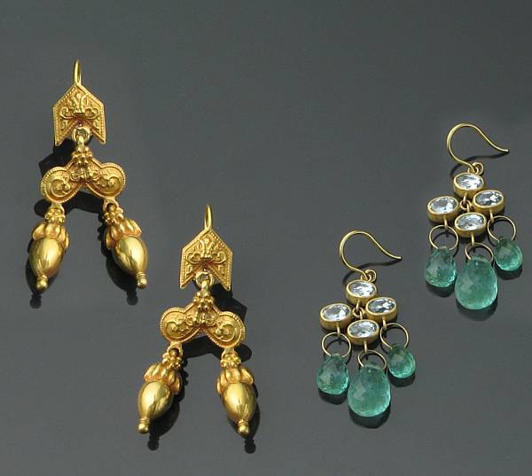 Appraisal: A pair of emerald aquamarine and gold earrings in Barney's