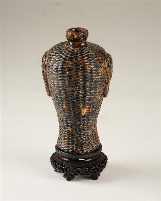 Appraisal: A th C Chinese Carved Natural Amber Vase in Basket