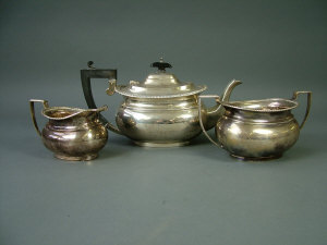 Appraisal: A George IV silver three piece tea set Birmingham comprising