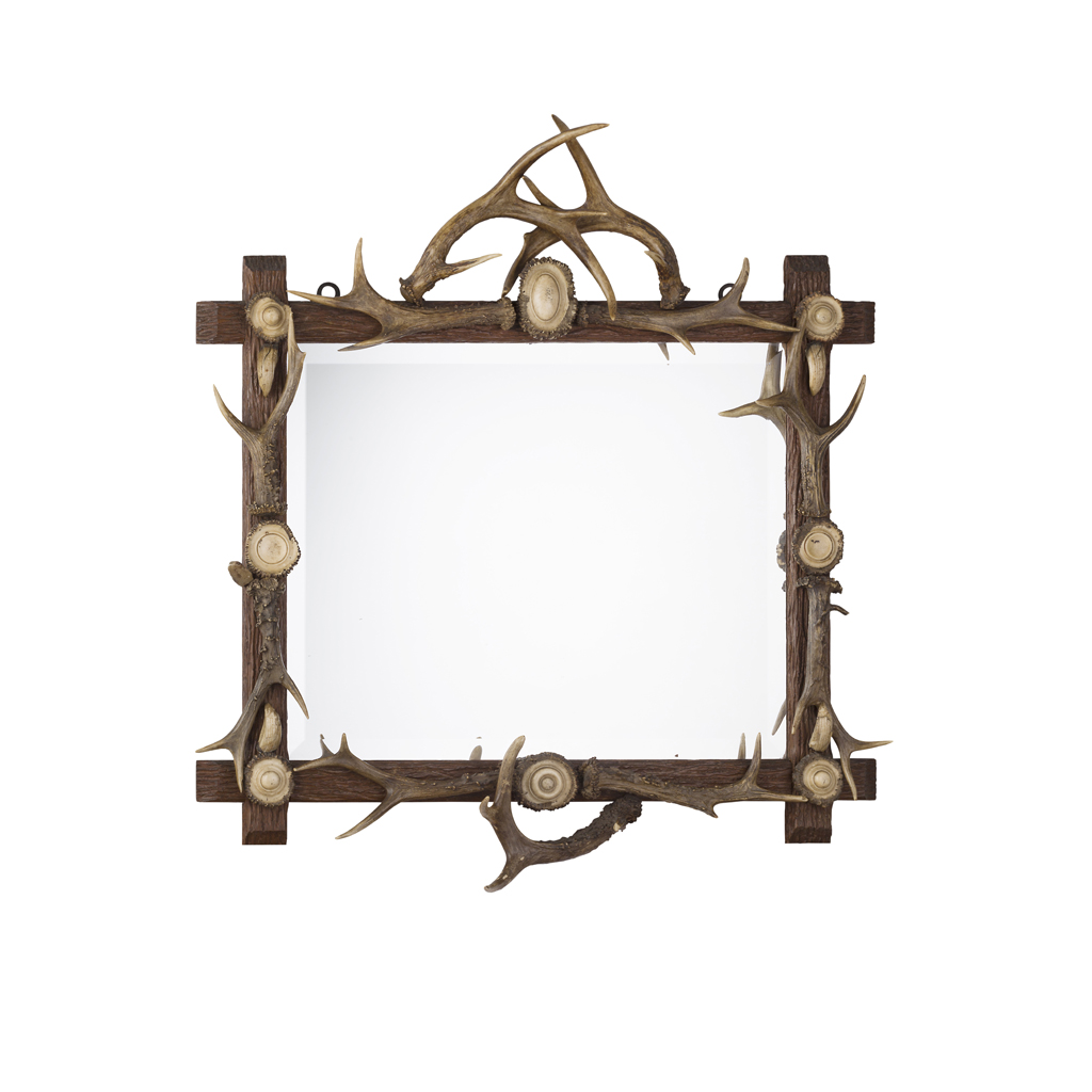 Appraisal: BLACK FOREST ANTLER MOUNTED MIRROR LATE TH CENTURY the rectangular