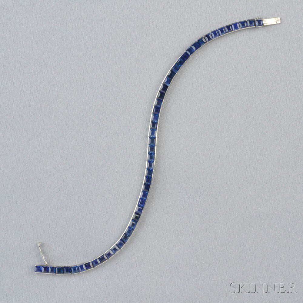 Appraisal: Platinum and Sapphire Line Bracelet Cartier France channel-set with fifty