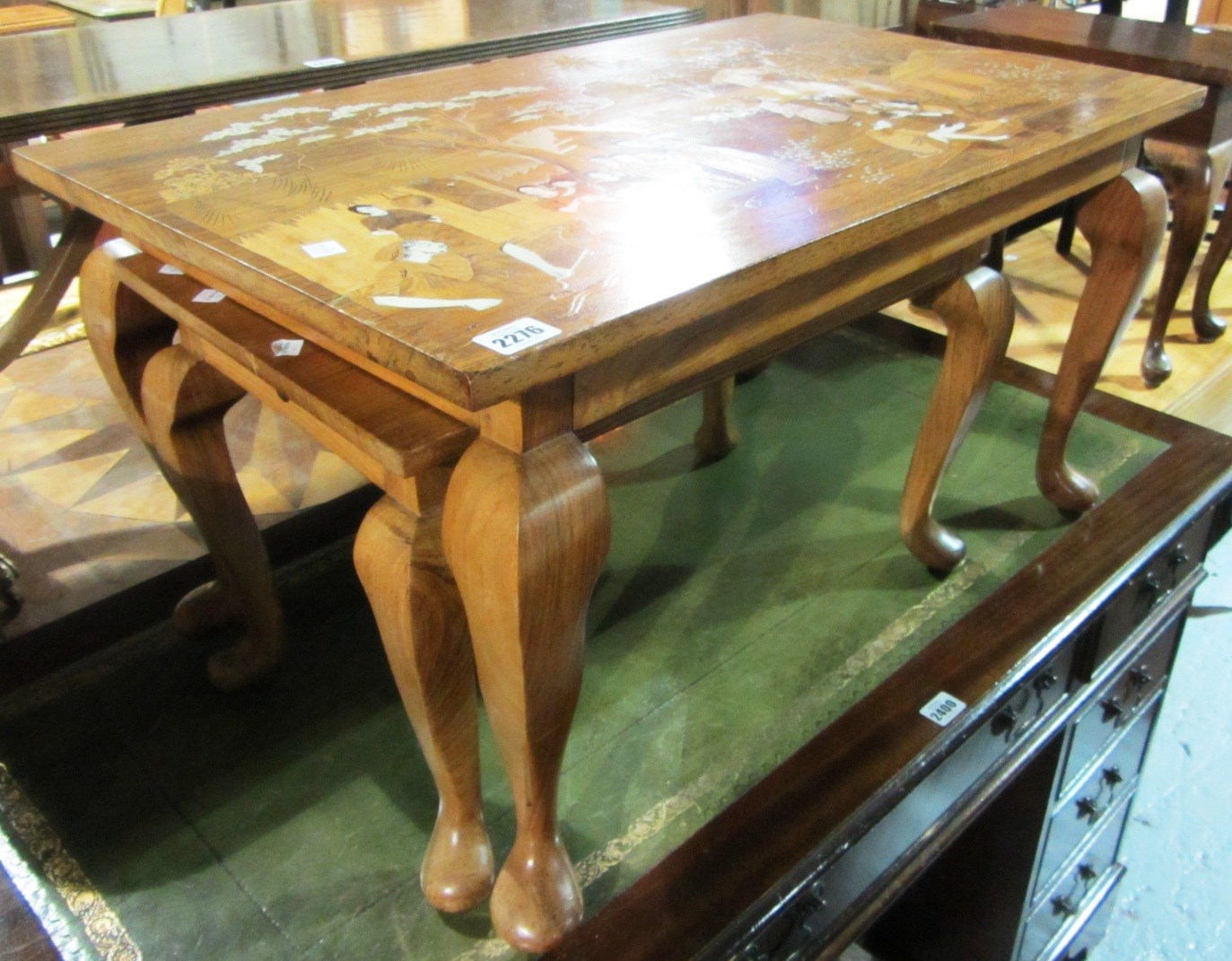 Appraisal: A nest of two th century Oriental inlaid tables