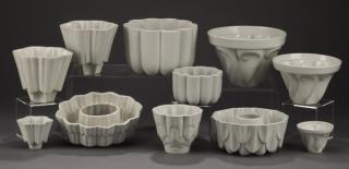 Appraisal: Shelley porcelain jelly molds executed in cream porcelain comprising small