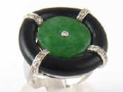 Appraisal: A continental hallmarked carat white gold onyx jade and diamond