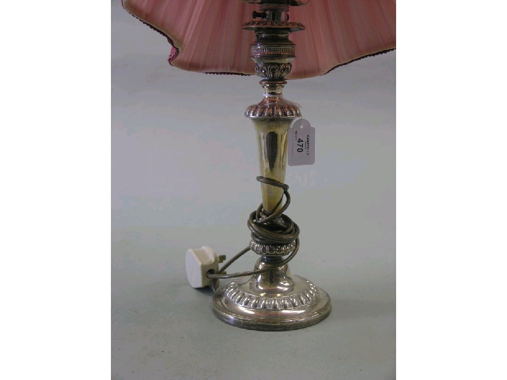 Appraisal: A Victorian candlestick silver plate on copper Georgian baluster-shape converted