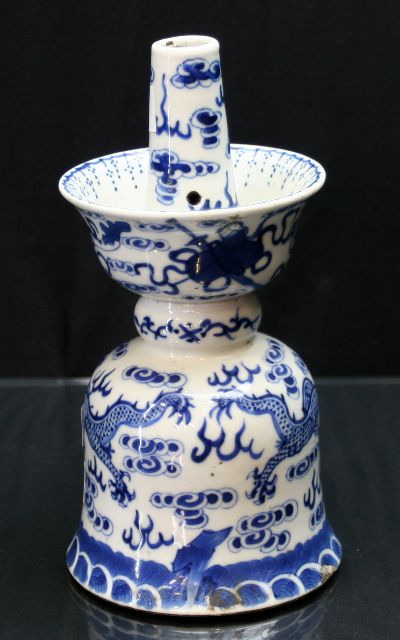 Appraisal: Chinese ball shaped candlestick in blue and white porcelain decorated